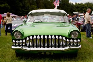 Suspension order from the Bureau of Automotive Repair vs. a green classic automobile